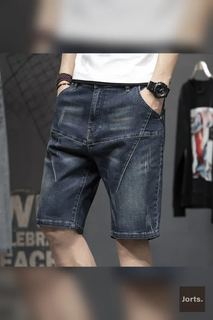Men's hand-painted retro denim shorts, side view showing five-point length