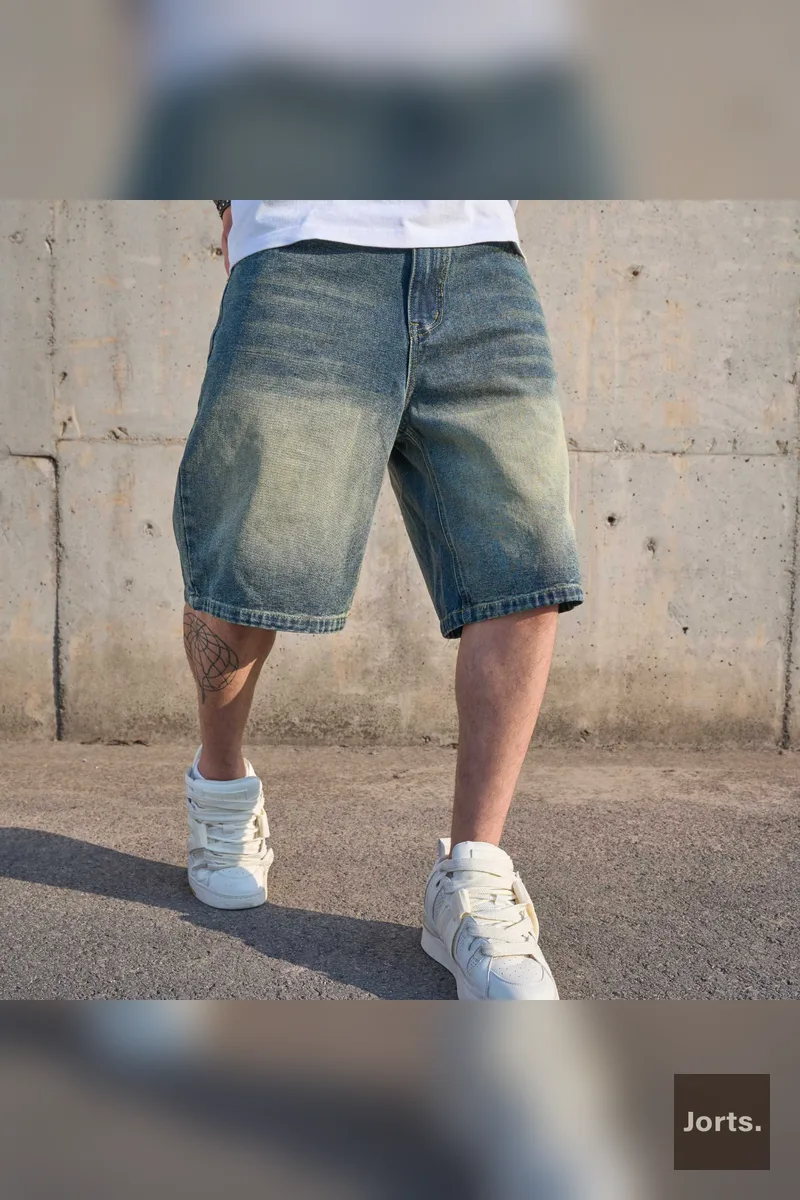 Mens loose fit denim straight leg pants, front view