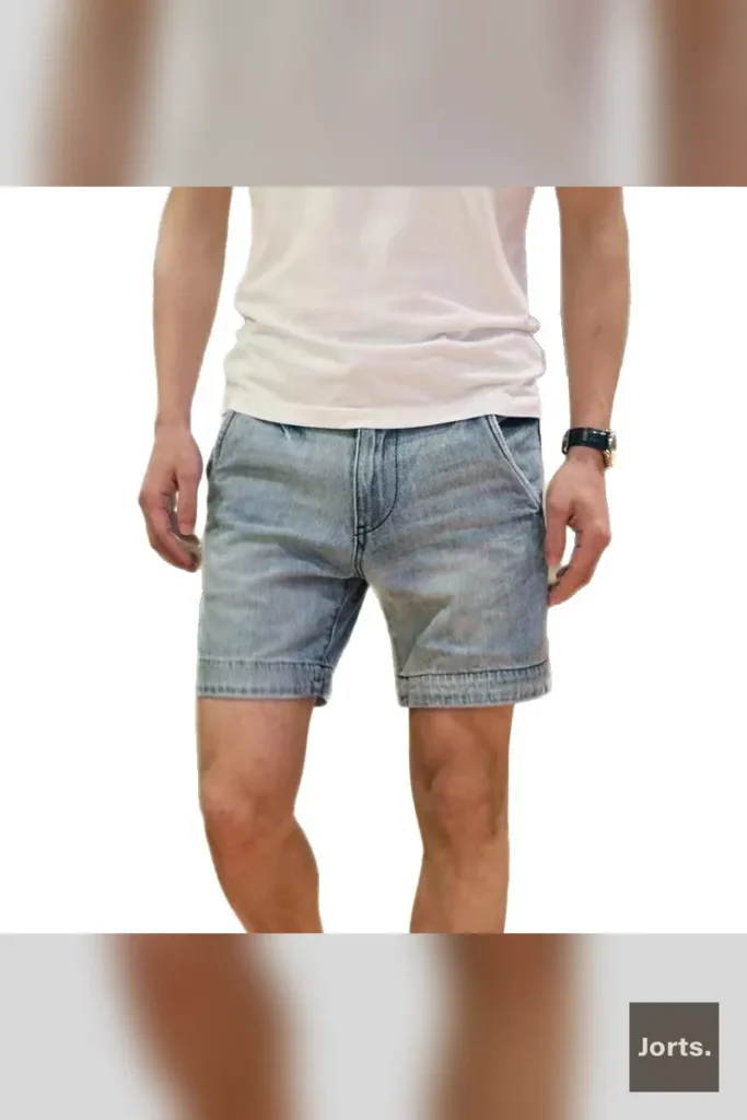 Mens relaxed fit black-grey denim jorts, front view worn by model